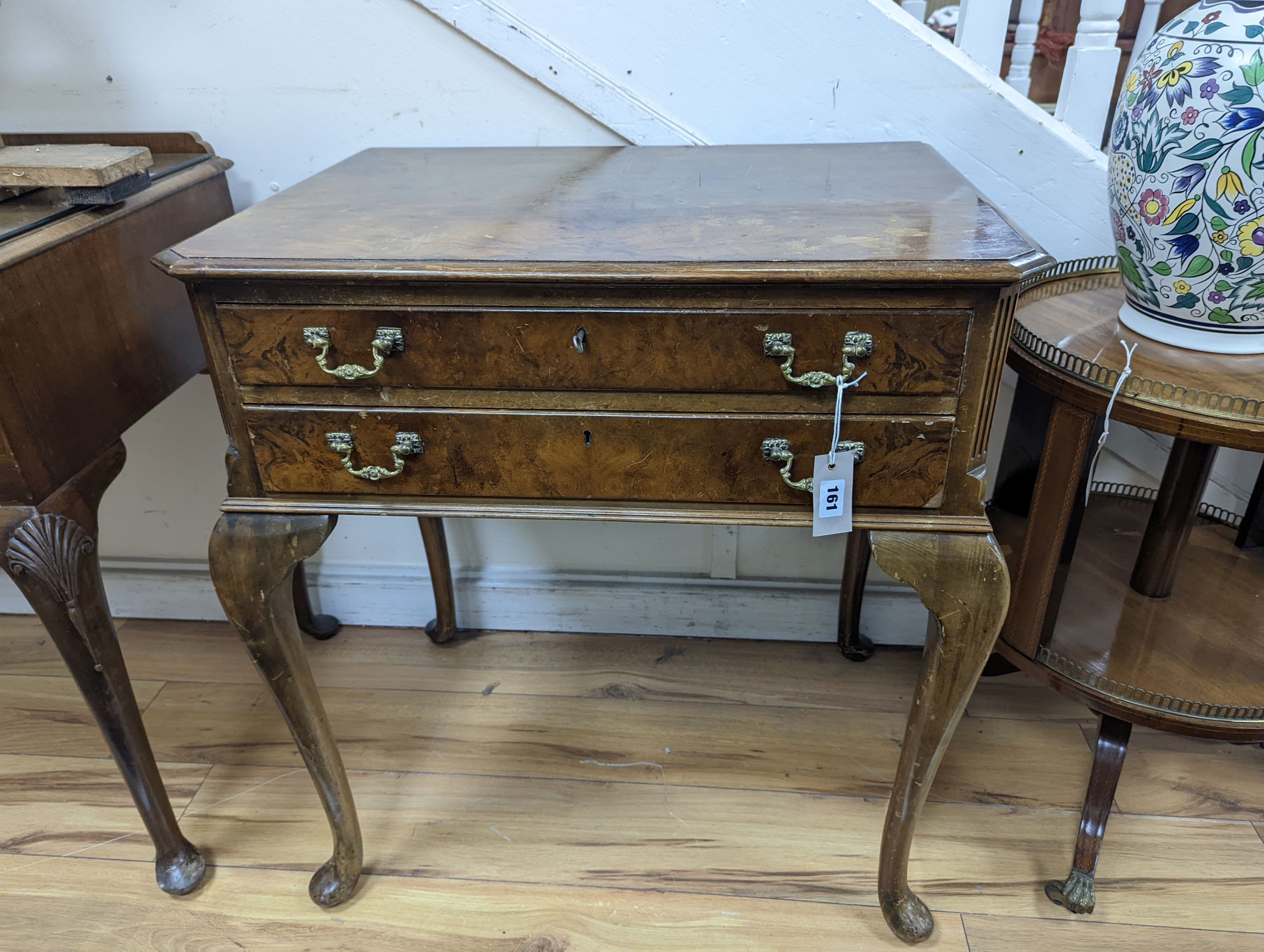 A Queen Anne revival walnut two drawer table canteen, (no contents), width 71cm, depth 51cm, height 78cm